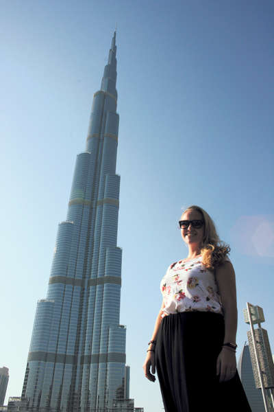 McClellan stands next to Dubai’s Burj Khalifa, which is the tallest building in the world.